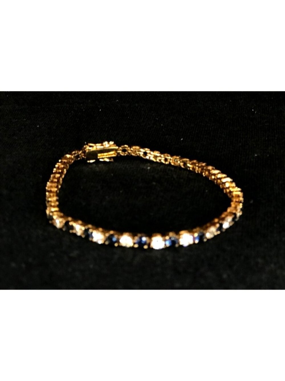Gold Tone Tennis Bracelet with Blue and Clear Rhinestones with Safety Lock - Picture 3 of 6